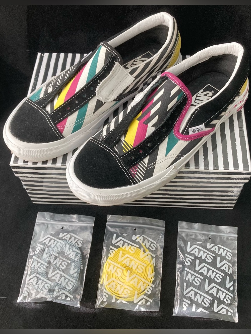 Vans “Off the Wall” slip-on with laces.